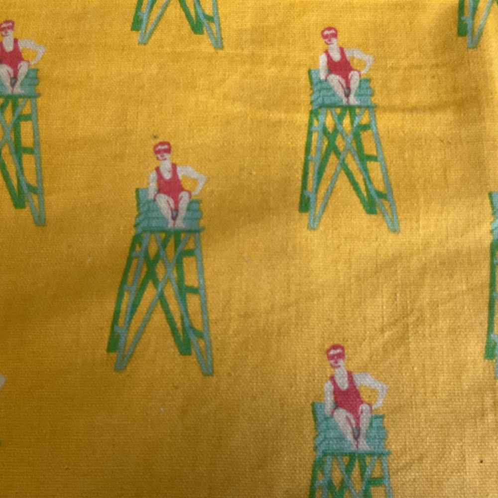 Vintage drape with lifeguard motif